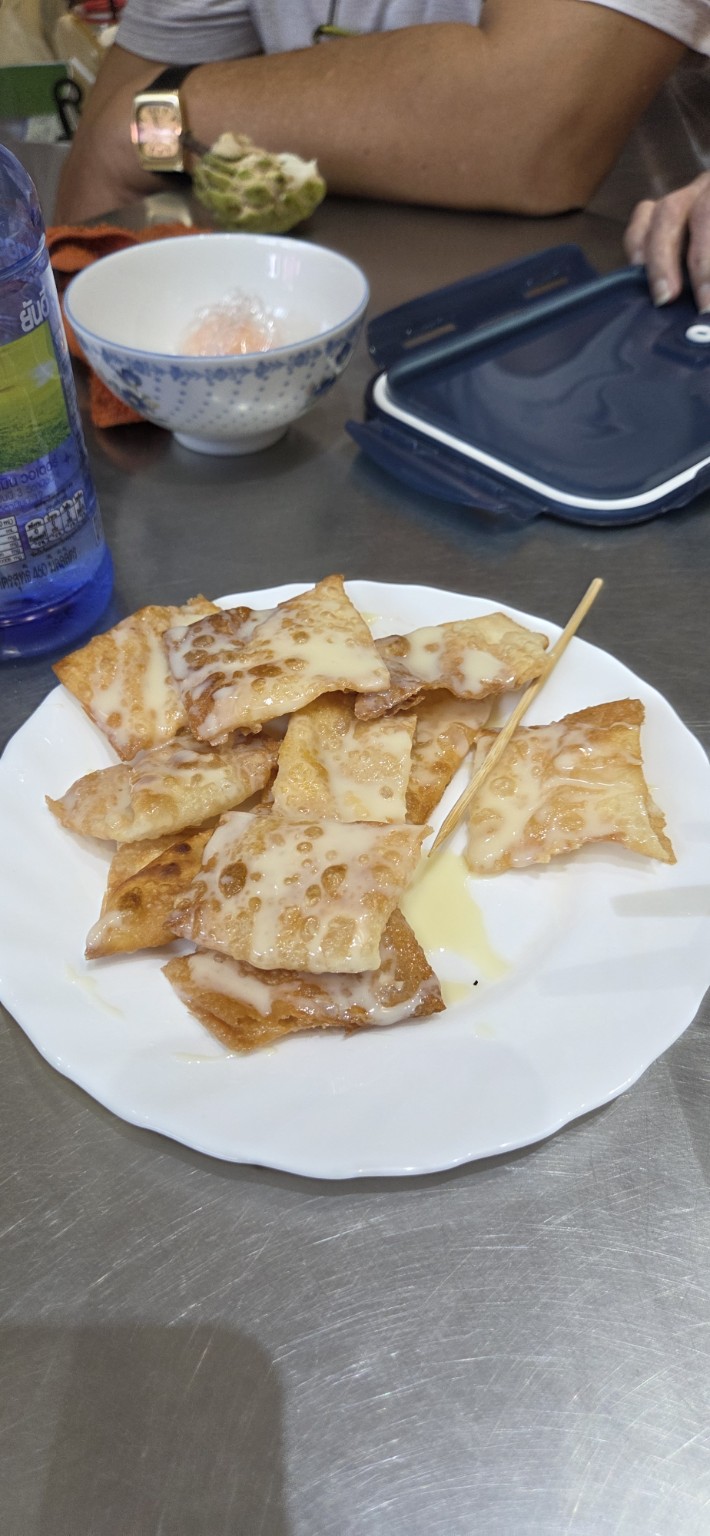 Crisp roti pieces drizzled with condensed milk